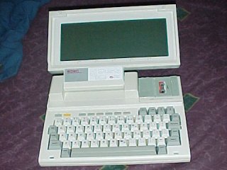 Still looking a lot like the NEC PC-8401A, the IS-11C has a full-size, albeit minimal, keyboard.